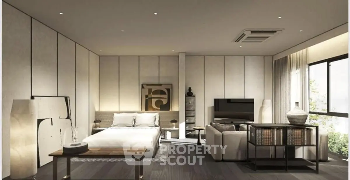 Luxurious modern bedroom with elegant decor and large windows offering natural light.