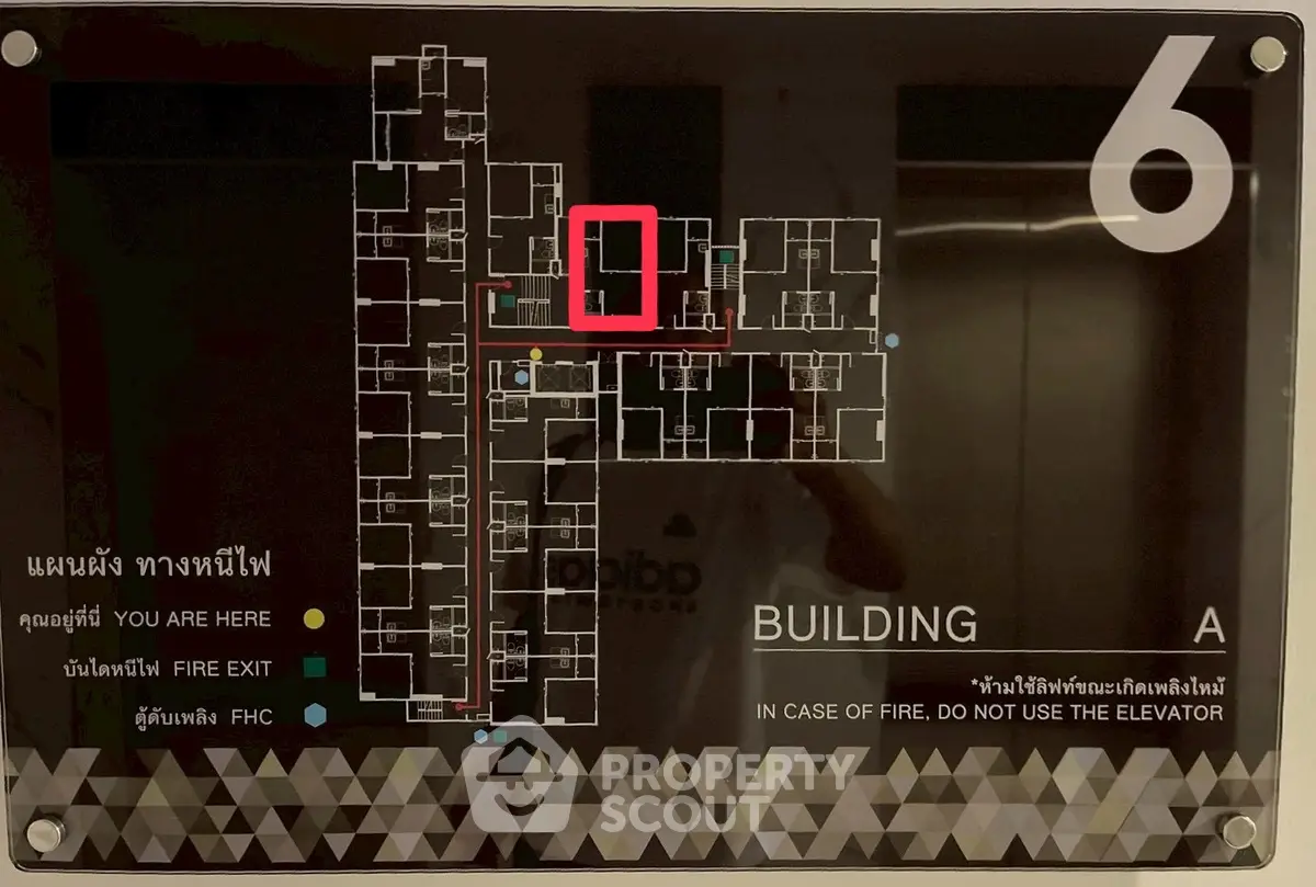 Floor plan of Building A with fire exit routes and unit locations highlighted.