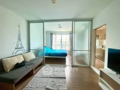 Modern living room with sliding glass doors and stylish decor