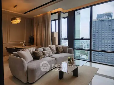 Luxurious living room with stunning city view and elegant decor in high-rise apartment.