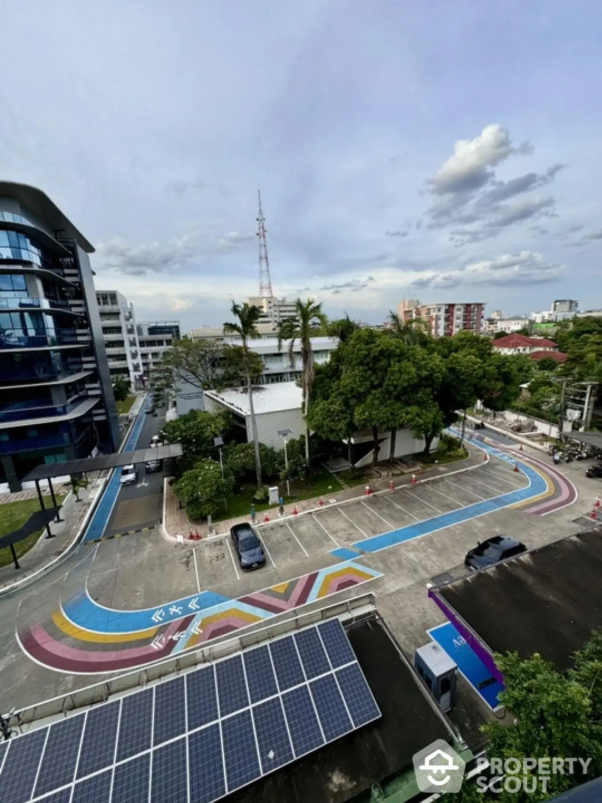 Stunning urban view with colorful road and modern buildings, perfect for city living enthusiasts.