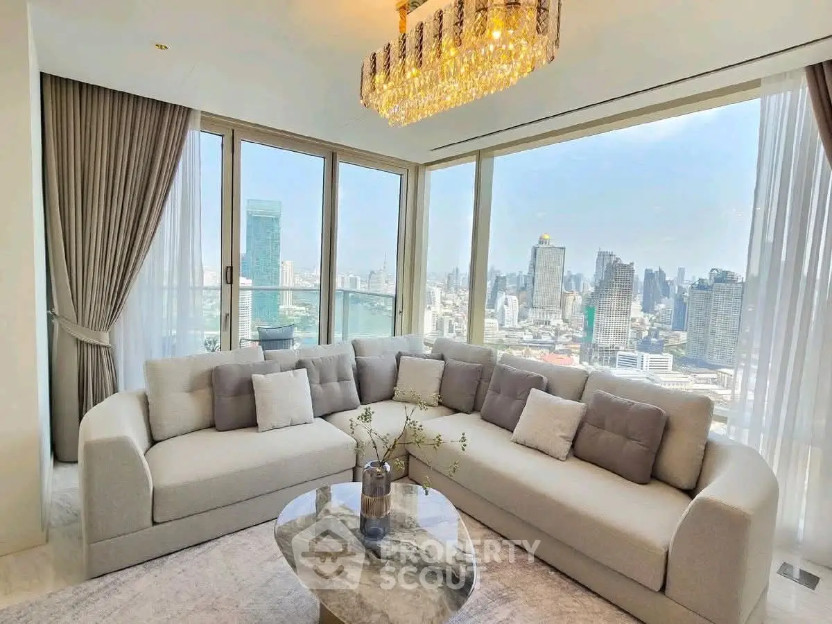 Luxurious living room with panoramic city view and elegant chandelier