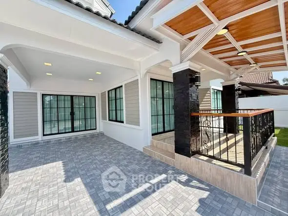 Spacious modern patio with elegant design and stylish railing