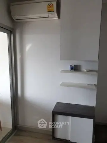 Modern interior with air conditioning and sleek shelving unit