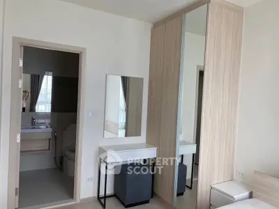 Modern bedroom with ensuite bathroom and stylish wardrobe