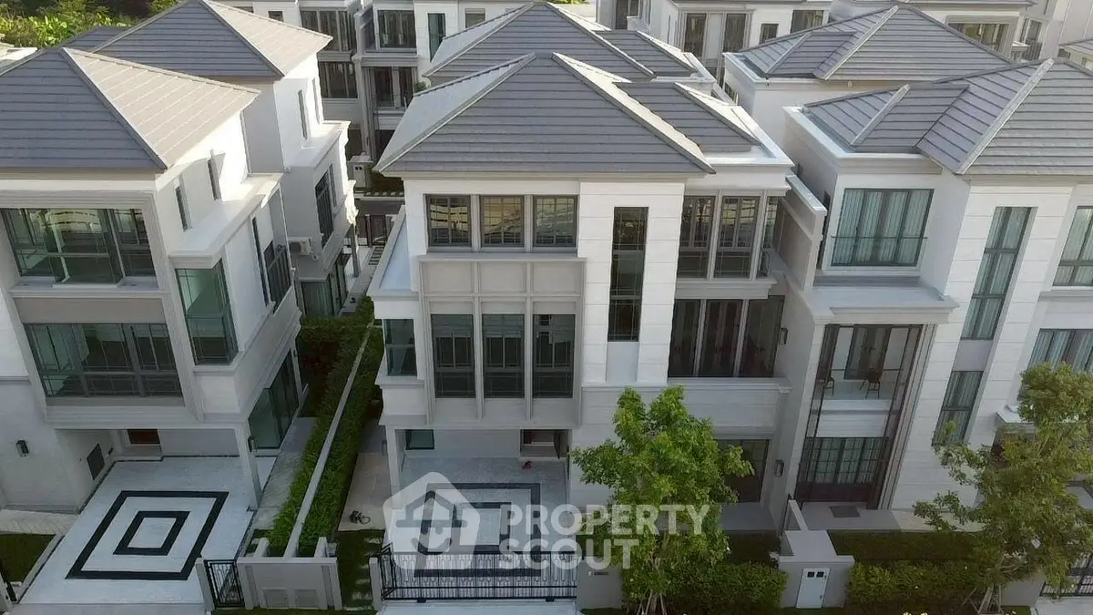 Luxurious modern villas with sleek architecture and spacious layout in a serene neighborhood.
