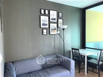 Modern living room with stylish decor and cozy seating area, perfect for relaxation and entertaining.