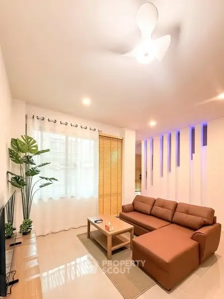 Modern living room with stylish sofa and elegant decor