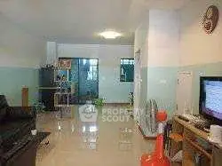 Spacious living room with modern decor and natural light