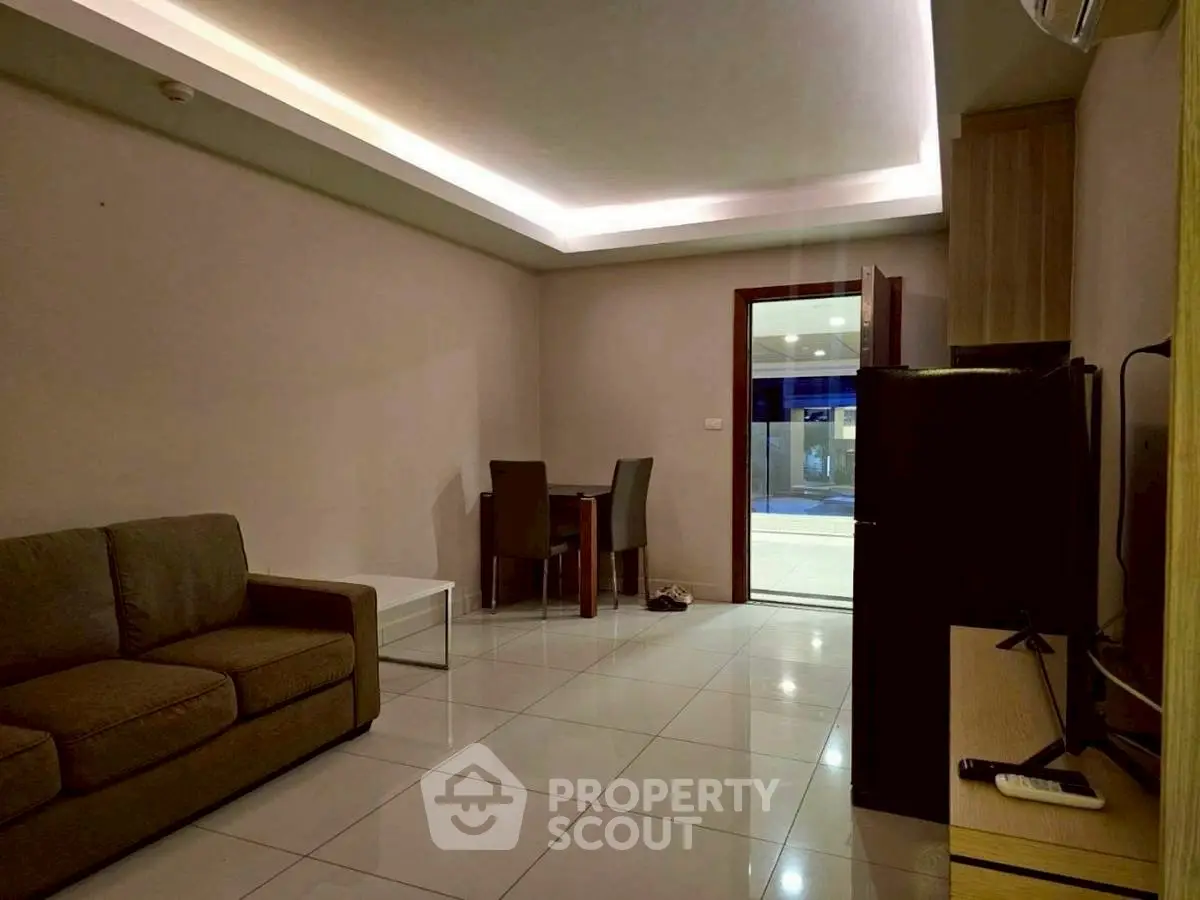 Modern living room with sleek furniture and ambient lighting