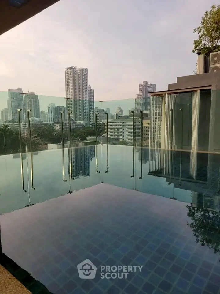 Stunning rooftop pool with panoramic city skyline views