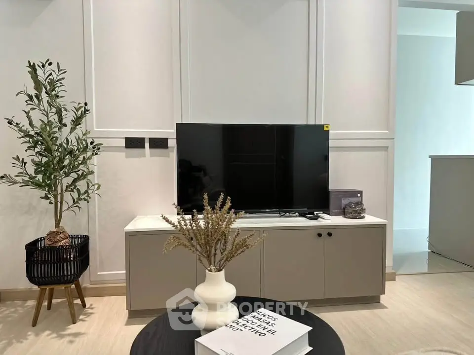 Modern living room with sleek TV setup and stylish decor