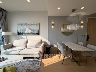 Modern living room with elegant dining area and stylish decor