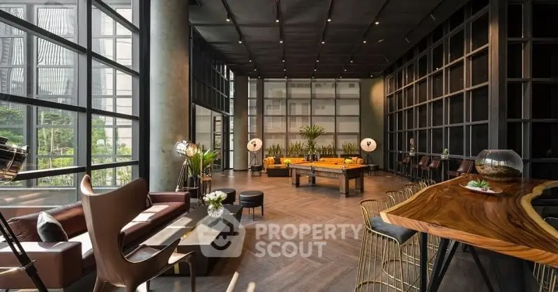 Luxurious modern living room with high ceilings, large windows, and elegant furnishings.