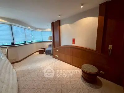 Spacious living room with modern design and large windows