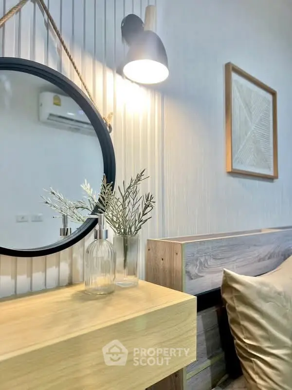 Stylish bedroom corner with modern decor and ambient lighting