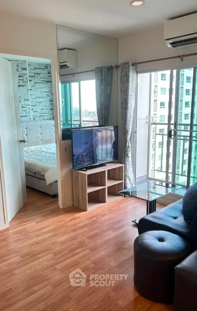 Modern living room with balcony view in high-rise apartment