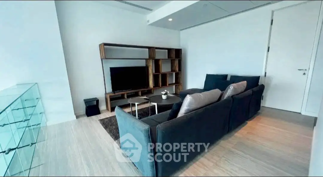 Modern living room with sleek furniture and stylish decor