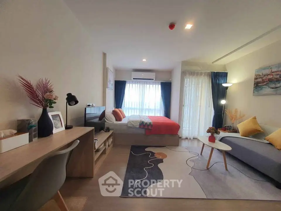 Modern studio apartment with stylish decor and natural light