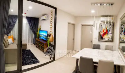 Modern living and dining area with stylish decor and open layout