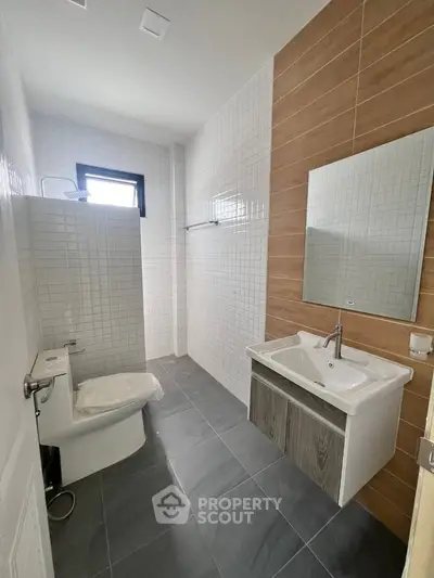 Modern bathroom with sleek fixtures and stylish tile design