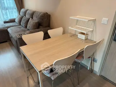 Modern living room with cozy sofa and dining table in a stylish apartment
