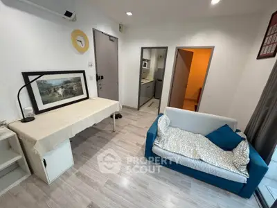 Modern living room with stylish decor and cozy seating area, perfect for relaxation and entertainment.