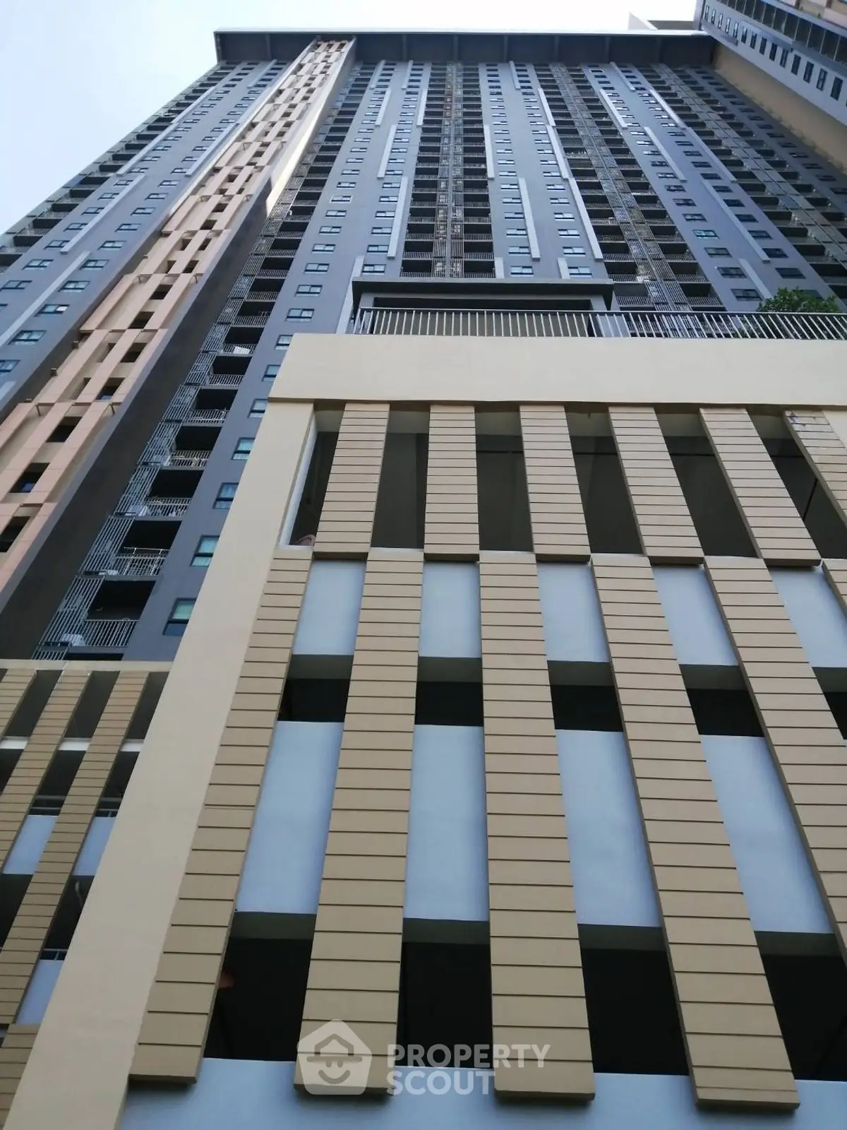 Modern high-rise building exterior with sleek architectural design