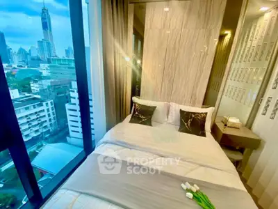 Luxurious bedroom with stunning city view in modern high-rise apartment