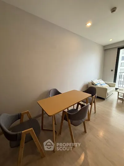 Modern living room with minimalist furniture and natural light