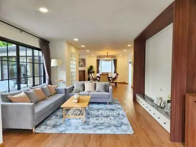 Spacious modern living room with elegant decor and natural light