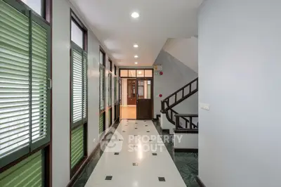 Spacious hallway with modern design and ample natural light