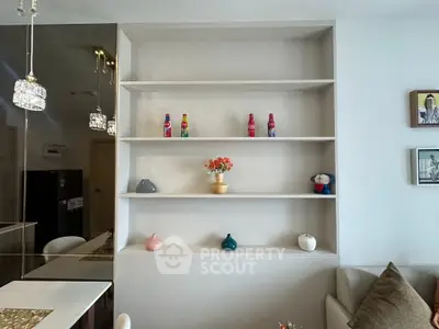 Modern living room with stylish shelving and elegant decor accents