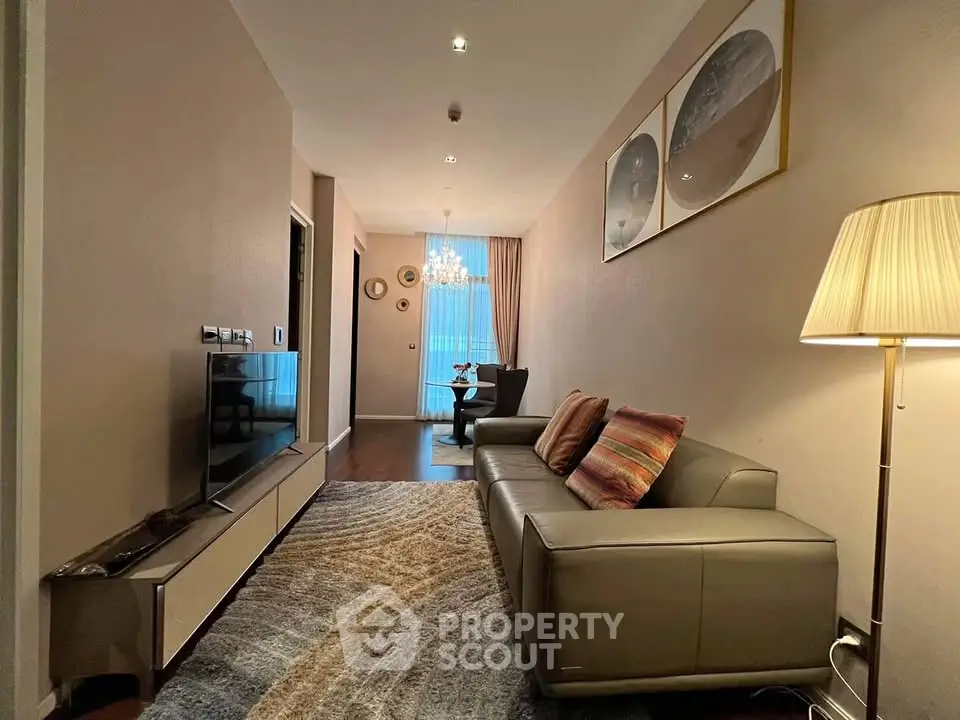 Stylish living room with modern decor and cozy seating area, perfect for relaxation and entertainment.