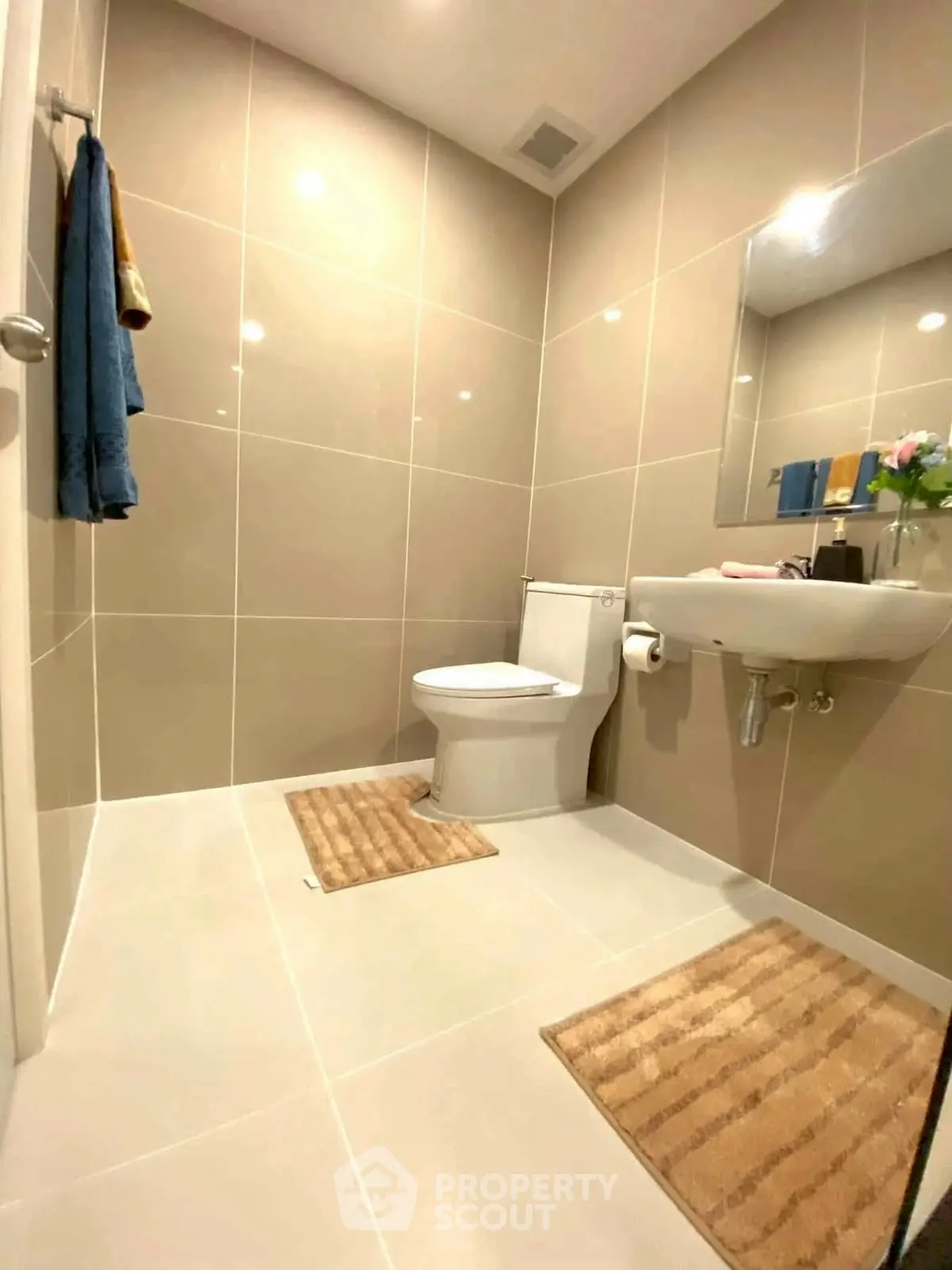 Modern bathroom with sleek tiles and contemporary fixtures