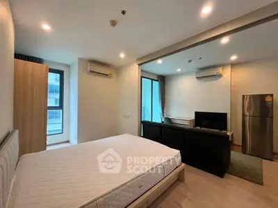 Modern studio apartment with open layout and natural light
