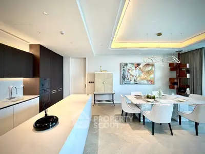 Luxurious modern kitchen and dining area with elegant decor and open layout