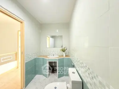 Modern bathroom with stylish tiles and elegant fixtures