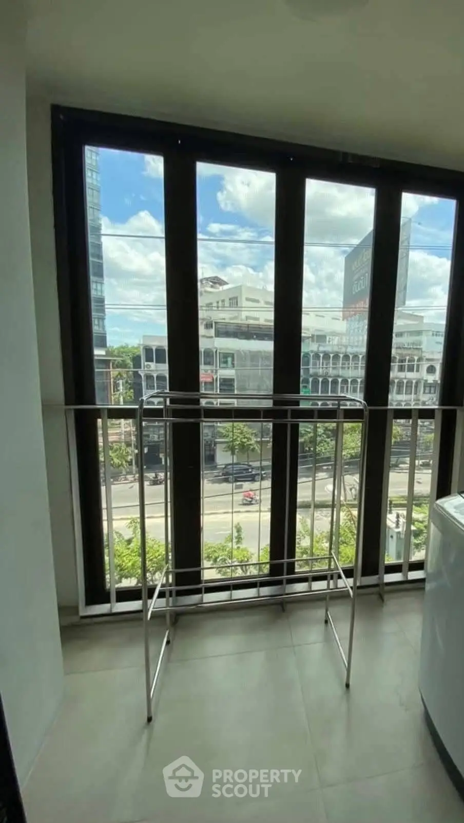 Modern balcony with city view and sleek railing design