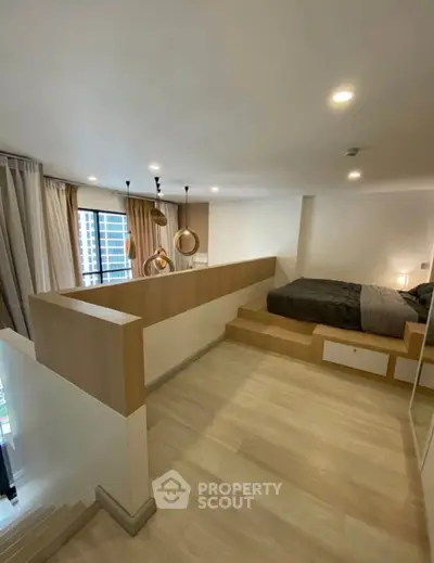 Modern loft bedroom with stylish lighting and wooden accents