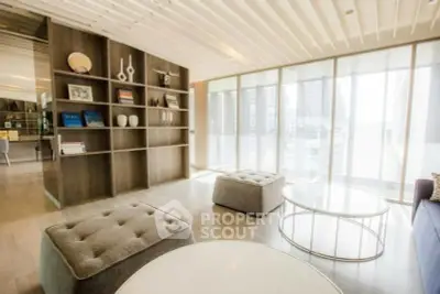 Spacious modern living room with stylish decor and natural light