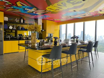 Stunning modern kitchen with vibrant yellow cabinets and city skyline view.