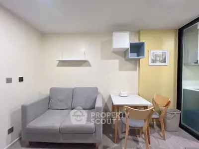 Cozy living room with modern furniture and stylish decor, perfect for urban living.