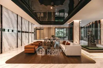 Luxurious modern living room with elegant marble and wood finishes, featuring stylish furniture and floor-to-ceiling windows.