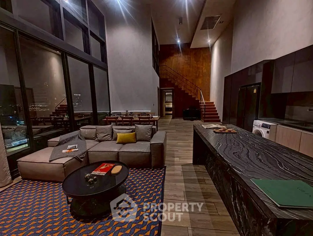 Luxurious modern living room with high ceilings and stylish decor