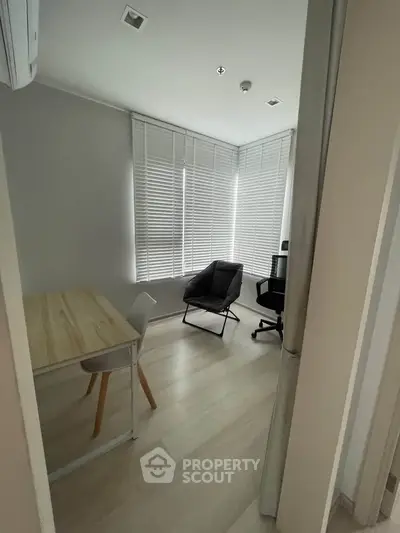 Modern study room with sleek furniture and natural light