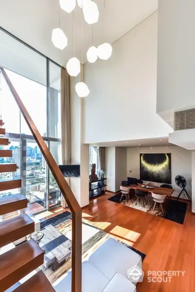 Luxurious modern living room with high ceilings and city view