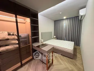 Modern bedroom with stylish furniture and ample storage space