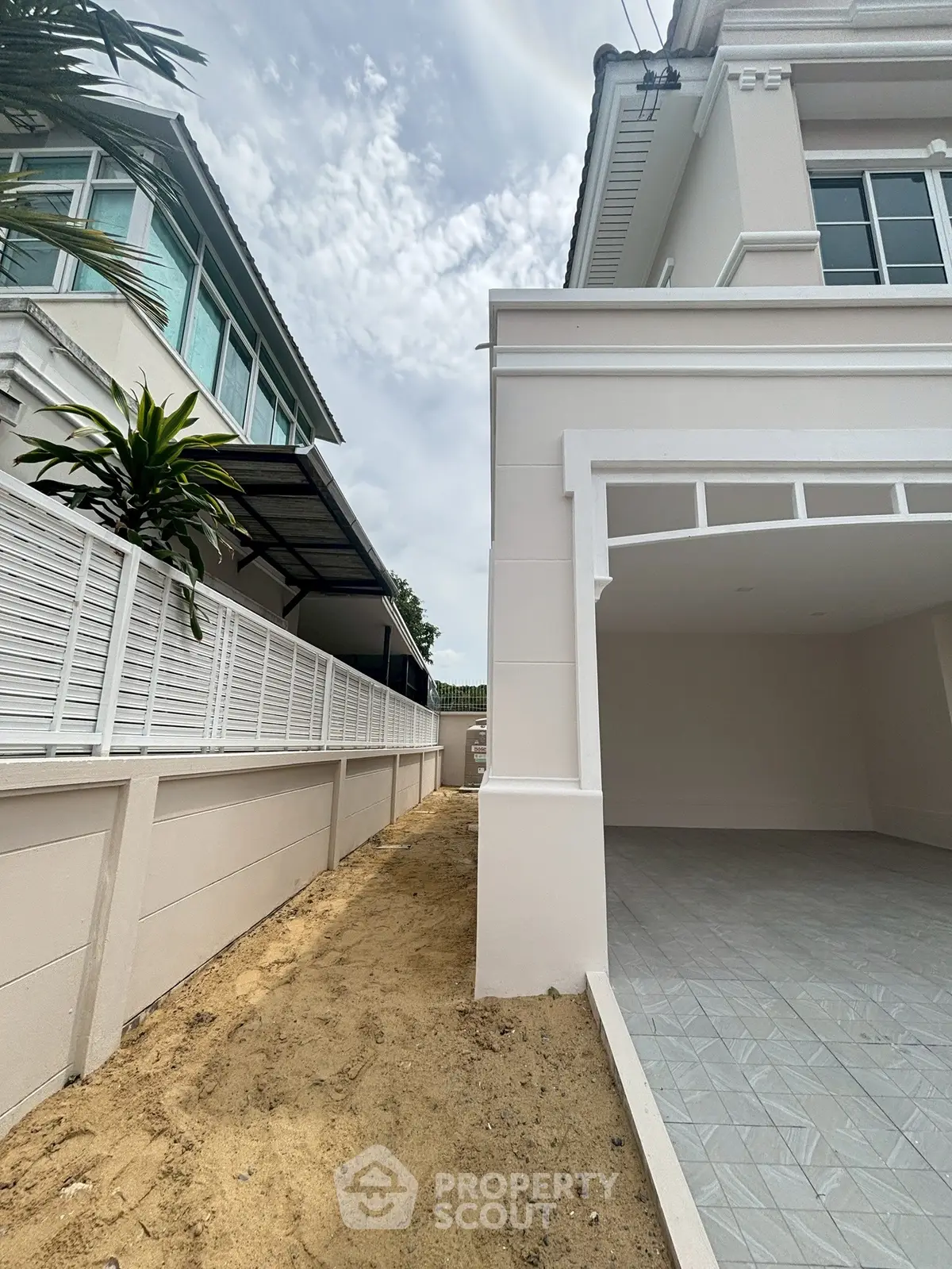 Modern residential exterior with spacious garage and elegant facade