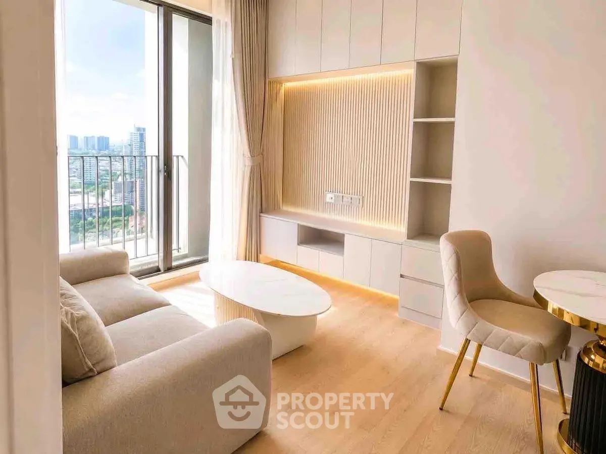 Modern living room with city view, elegant furniture, and natural light.